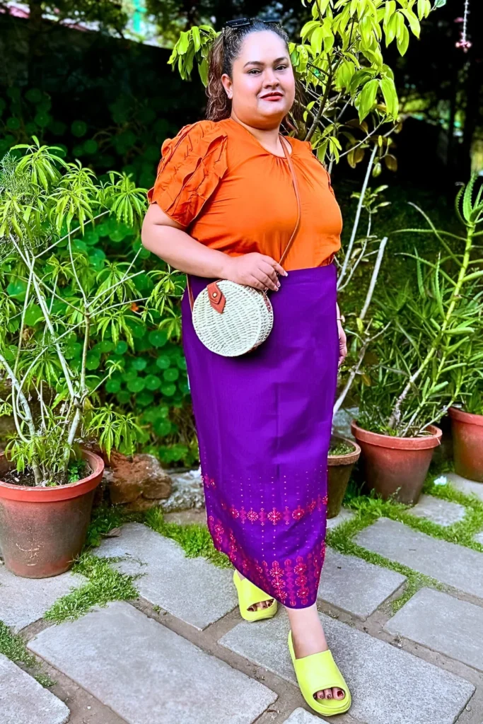 Orange Puff-Sleeve Top with Purple Sarong & Neon Slides