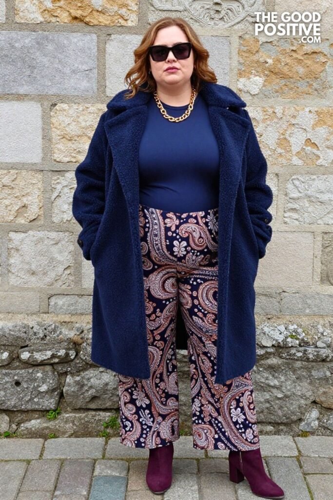 Plus Size Plum Faux-Shearling Coat With Printed Paisley Wide-Leg Trousers and Mock-Neck Outfit