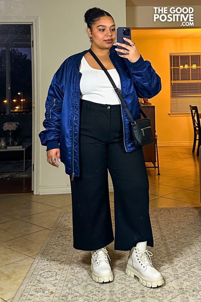 Cobalt Satin Bomber Jacket With White Ribbed Tank, Black Wide-Leg Trousers And High-Top Sneakers