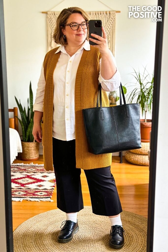 Mustard Sweater Vest Over White Collared Shirt With Black Culottes